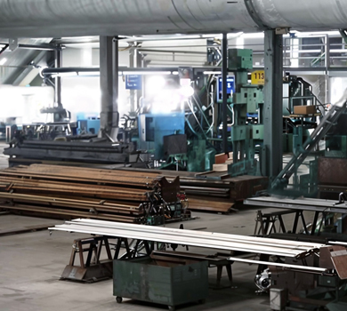 Factory scene showcasing steel pipe cutting, highlighting DELTA CAINA's precision techniques and efficient manufacturing processes for furniture hardware production.